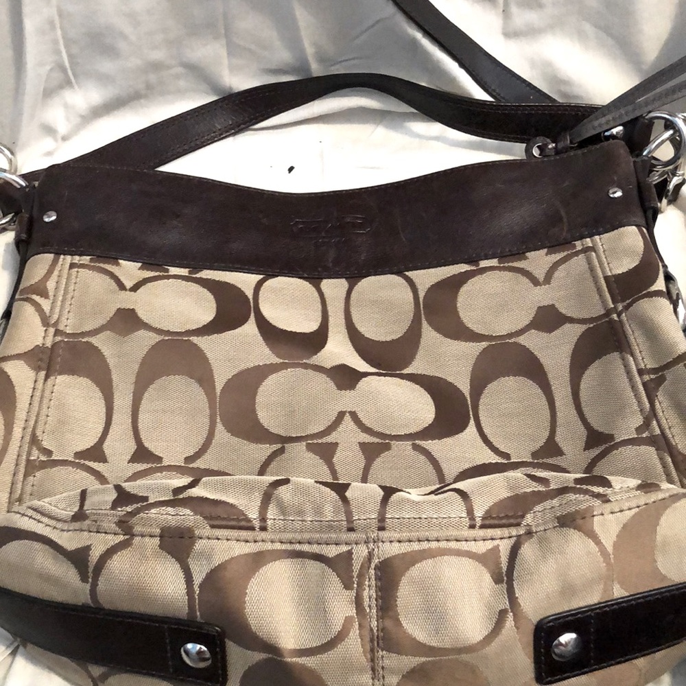 Cognac Coach Purse with two handles   Partially brand new. Rarely used.
